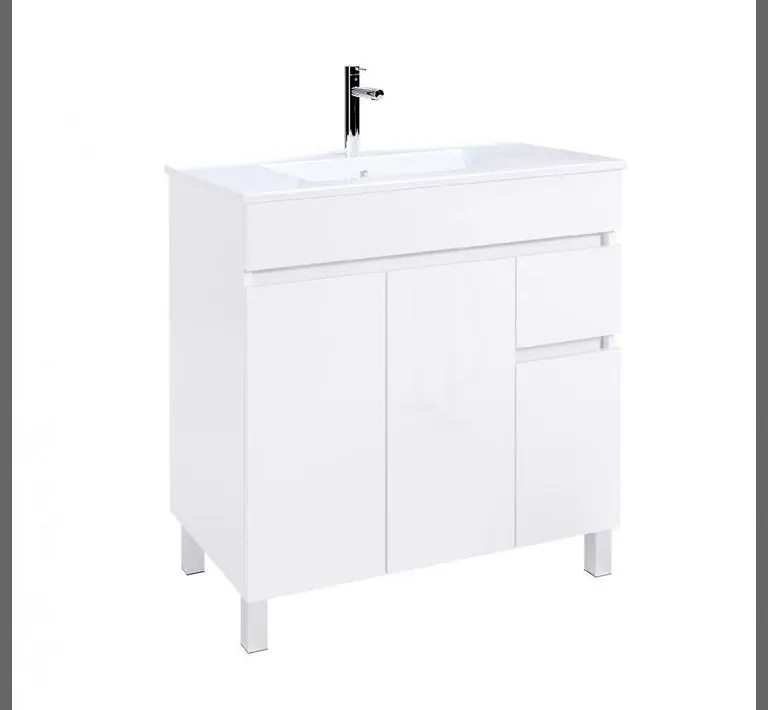 Detalhe de móvel de lavatório branco com gavetas abertas